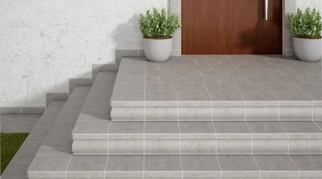 Mẫu bậc tam cấp gạch giả đá màu xám hiện đại cho các gia chủ thích sự tối giản